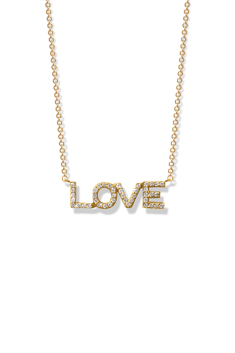 A delicate 14k yellow gold necklace featuring a word pendant that spells out "Love" encrusted with diamonds. 