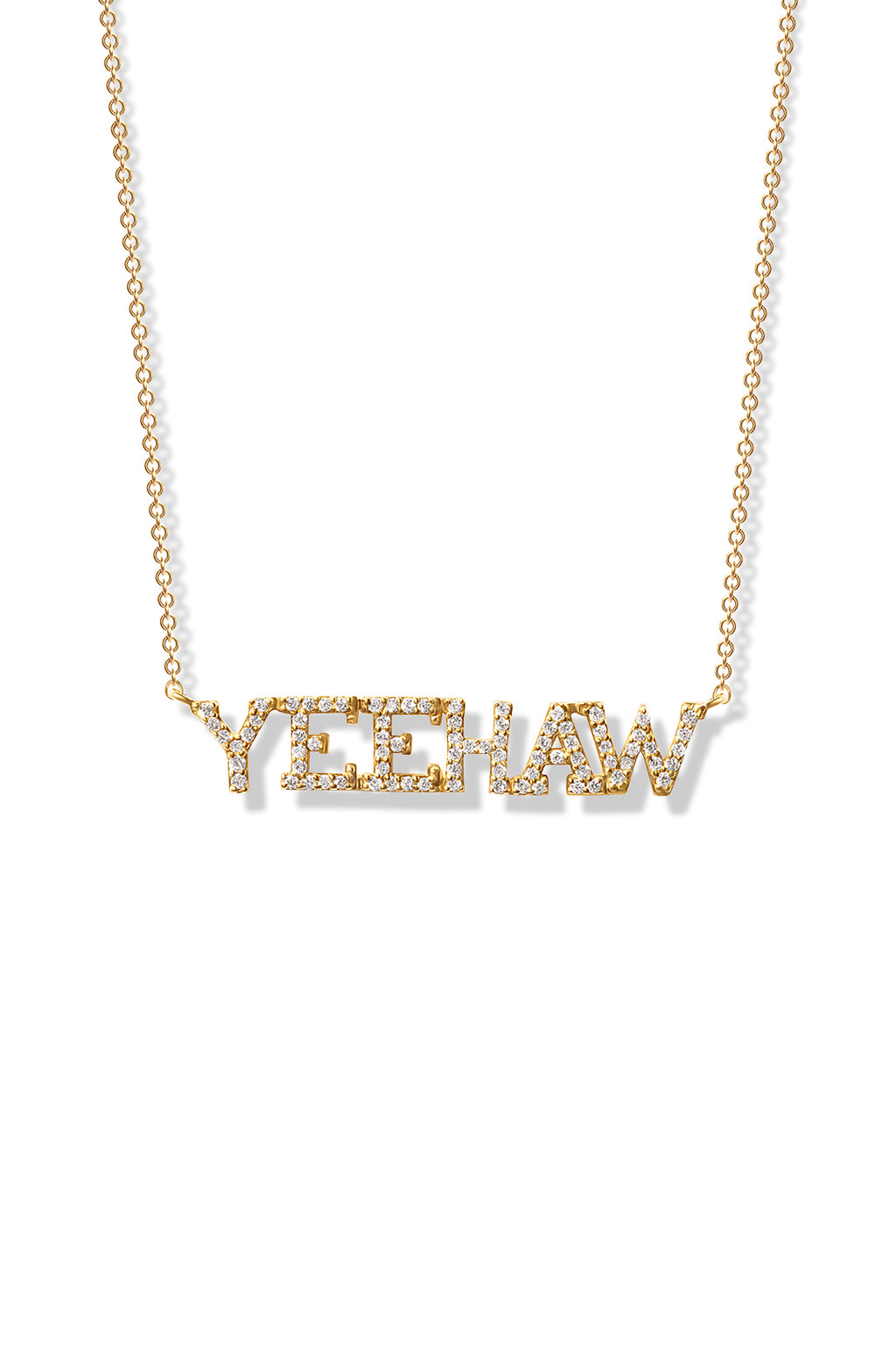 A delicate Gold necklace featuring the word "yeehaw" pendant encrusted with diamonds. 