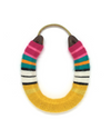 A lucky horseshoe that is wrapped in a multi-colored yarn.