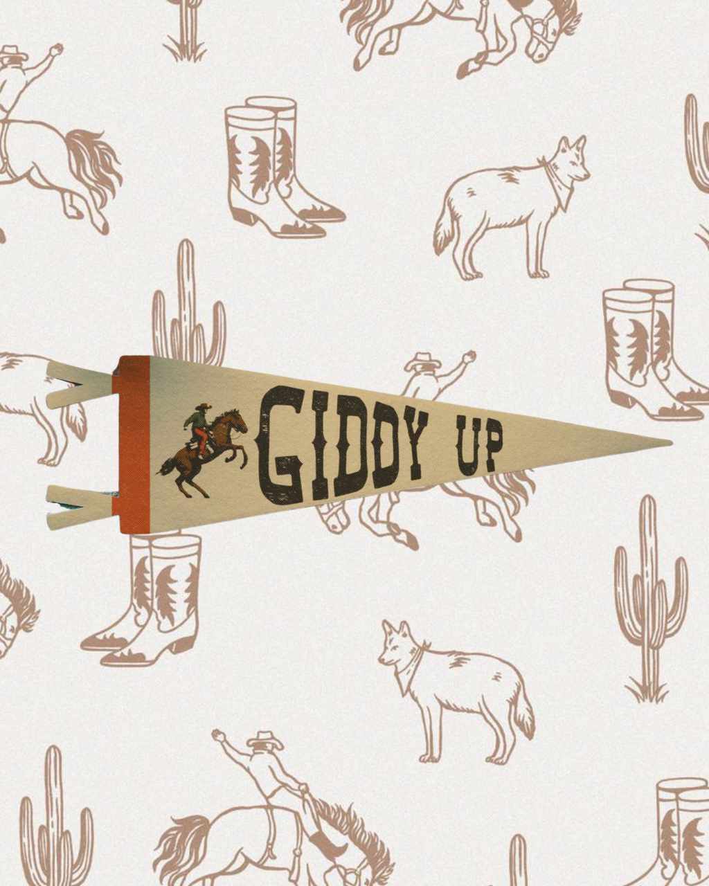 A vintage-style pennant flag with the words "Giddy Up" written in bold, black letters. The flag features an illustration of a cowboy riding a bucking bronco. The background is a repeating pattern of Western-themed elements, including cowboy boots, cacti, and coyotes, all in a muted brown color on a beige backdrop.