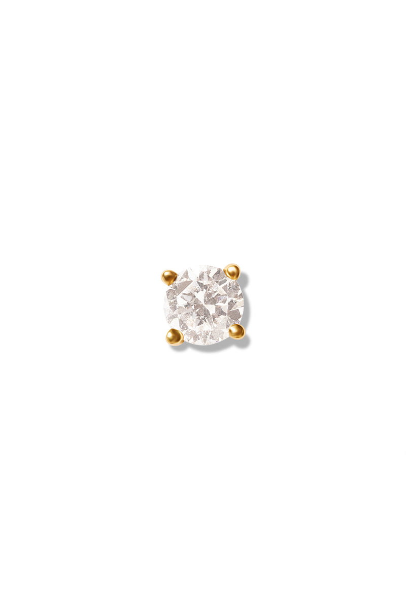 Close-up of a single diamond stud earring set in a four-prong yellow gold setting, displayed on a white background