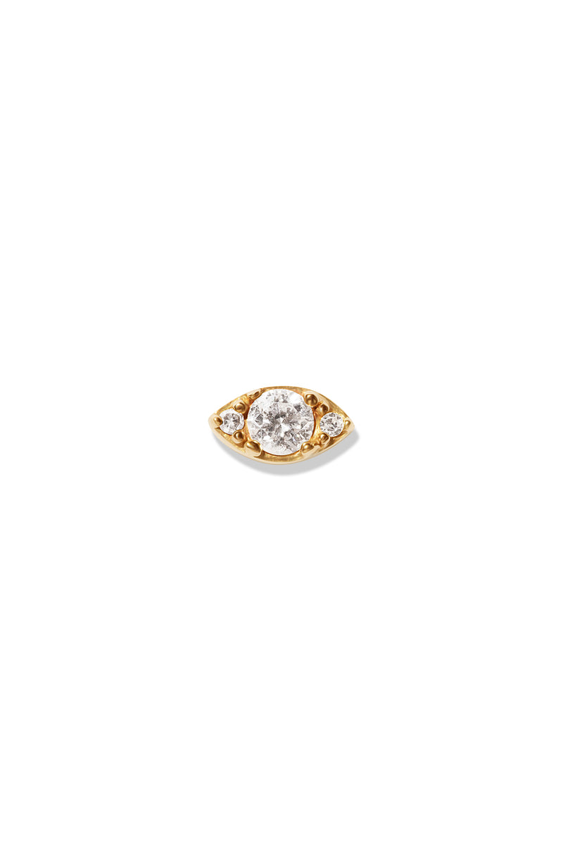 A small 14K gold stud earring designed in the shape of an eye, featuring a central round diamond flanked by two smaller diamonds on each side. 