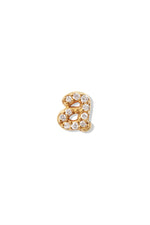 A small 14K yellow gold stud earring in the shape of the letter "a", encrusted with diamonds.