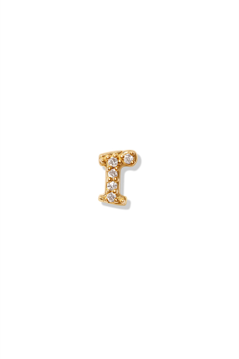 A small 14K yellow gold stud earring in the shape of the letter "r", encrusted with diamonds.