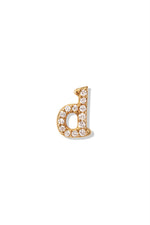 A small 14K yellow gold stud earring in the shape of the letter "d", encrusted with diamonds.